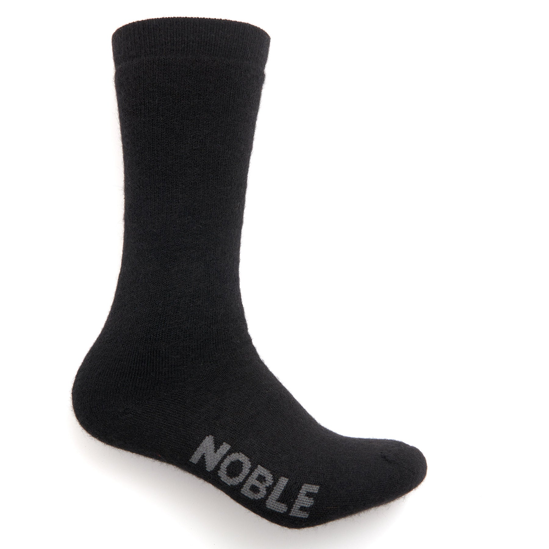 A black alpaca boot sock with the Noble logo on the sole, shown upright on a white background.