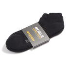 Noble alpaca no-show socks shown low-cut inside a trainer, hidden below the ankle.