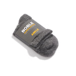 Grey Noble alpaca ankle socks in a Noble paper band