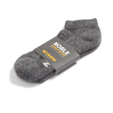 Grey Noble alpaca no-show sock with a Noble paper band